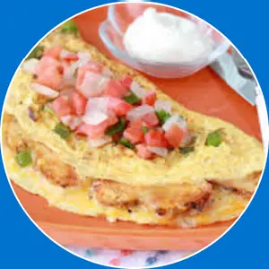 “Omelette filled with chicken, peppers, and onions.”