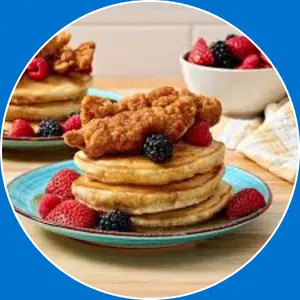 “Crispy chicken served with fluffy pancakes.”