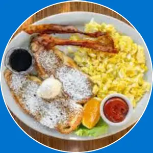 “French toast served with eggs and sausage.”