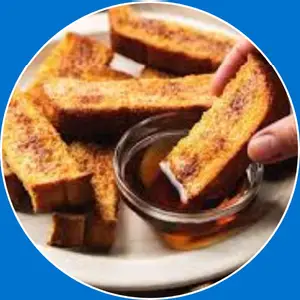 “Crispy French toast sticks served with syrup.”