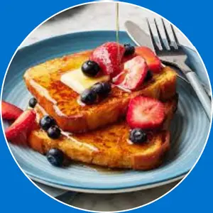 “Golden French toast topped with syrup.”