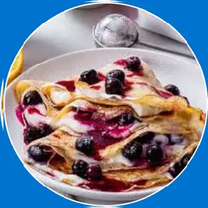“Crepe filled with lemon ricotta and blueberries.”