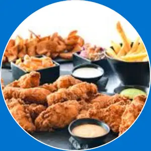 “Chicken Strips Family Meal with crispy, golden chicken strips served with dipping sauces and family-style sides.”