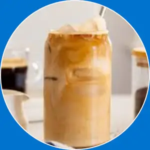 “Tall glass of iced latte with milk and espresso over ice.”