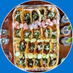 “Taco Family Pack with seasoned tacos, fresh toppings, and sides, perfect for a family-style meal.”