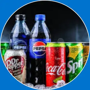 “Glass of soft drink with ice and bubbles.”