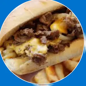 “Stacked Philly cheesesteak with beef, peppers, and melted cheese.”