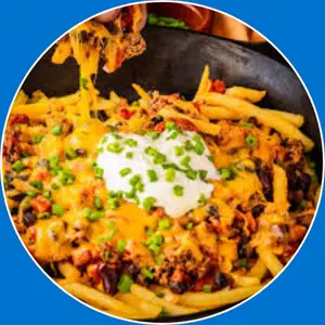 “French fries topped with chili and melted cheese.”