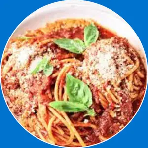 “Spaghetti with marinara sauce featuring tender pasta topped with rich, flavorful tomato sauce.”
