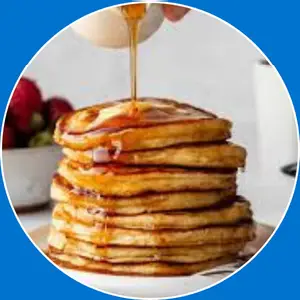 “Classic buttermilk pancakes served with syrup.”