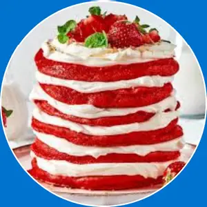 “Soft red velvet pancakes with cream cheese topping.”