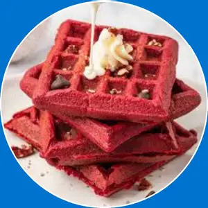 “Red velvet waffle with cream cheese topping.”