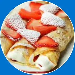 “Crepe filled with strawberries and cream.”
