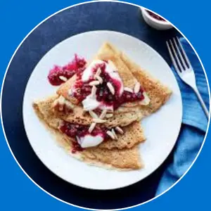 “Crepe topped with sweet lingonberry sauce.”