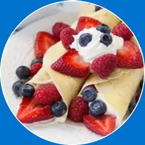 “Crepe topped with a mix of three fresh berries.”