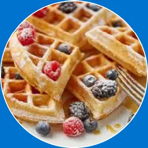 “Crispy waffles served with syrup.”